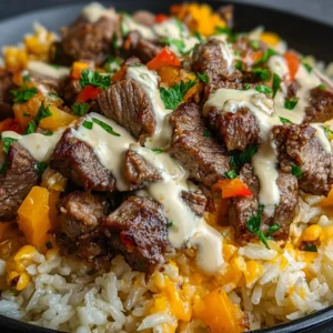 Steak & Queso Rice Bowl: Juicy steak, cheesy rice, and toppings.