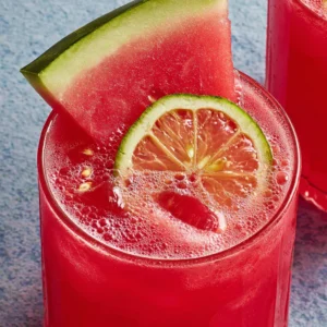Fresh watermelon lemonade in a glass. Refreshing summer drink.
