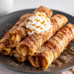 Air fryer apple pie taquitos, golden brown & crispy.