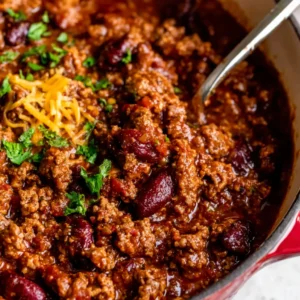 Close-up of hearty, homemade chili in a bowl. Best chili recipe.