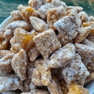 Caramel apple puppy chow snack mix. Chex cereal with caramel, apple, and powdered sugar.