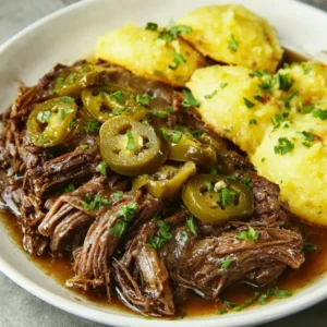 Easy Instant Pot Mississippi Pot Roast features tender, shredded beef with flavorful gravy, showcasing a simple and delicious weeknight dinner recipe.