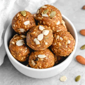 Easy pumpkin protein balls are displayed, perfect for a healthy and delicious snack.
