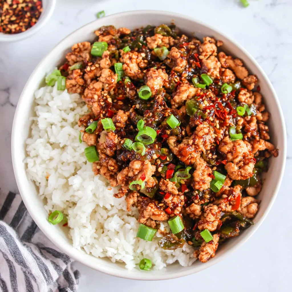 Featured image of a flavorful Firecracker Ground Chicken Bowl, showcasing a delicious and easy weeknight dinner recipe.