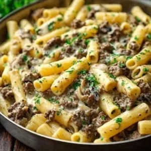 Delicious Philly Cheesesteak Pasta, featuring creamy sauce and tender steak, served as a featured image.