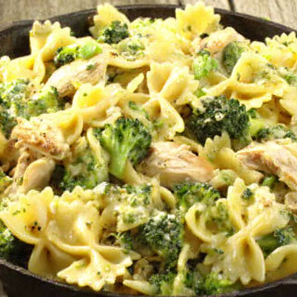 Close-up of creamy Rotisserie Chicken Broccoli Pasta, showcasing the tender chicken and vibrant green broccoli.