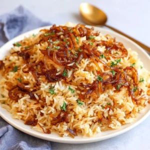 BEST FRENCH ONION BUTTER RICE 2 French Onion Butter Rice is shown in a close-up featured image, highlighting its creamy texture and caramelized onions.