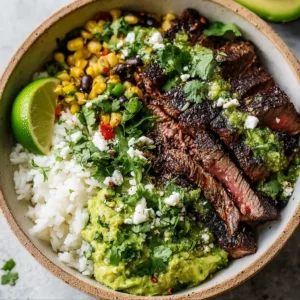 CILANTRO LIME STEAK BOWLS ULTIMATE 2 Close-up of delicious Cilantro Lime Steak Bowls featuring grilled steak, vibrant cilantro lime rice, and fresh toppings.