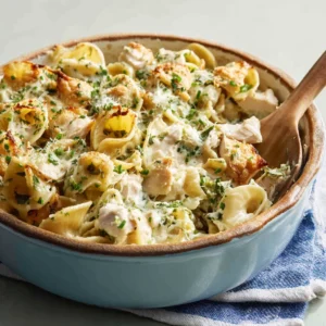 CREAMY CHEESY CHICKEN PASTA BAKE ULTIMATE 2 Creamy Cheesy Chicken Pasta Bake featured image showing a golden-brown, bubbly casserole dish filled with creamy pasta, chicken, and melted cheese.