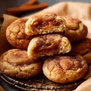 IRRESISTIBLE APPLE BUTTER SNICKERDOODLES 2 A close-up shot showcases freshly baked Apple Butter Snickerdoodles, lightly dusted with cinnamon sugar.