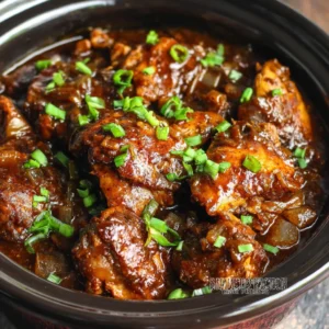 PERFECT SLOW COOKER BOURBON CHICKEN 2 Delicious Bourbon Chicken glistens in a close-up featured image.