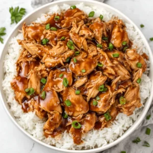 PERFECT SWEET HAWAIIAN CROCKPOT CHICKEN 2 Sweet Hawaiian Crockpot Chicken is shown as a delicious, easy meal cooked in a slow cooker.