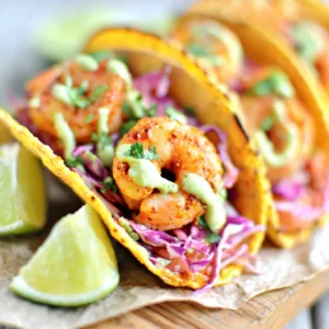 SPICY SHRIMP TACOS AMAZING 2 A delicious close-up showcases flavorful Spicy Shrimp Tacos, perfect for a vibrant meal.