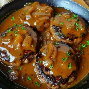 Salisbury Steak: The Very Best Classic Comfort Dinner 2 lina033321 Close up food photo of four Salisbury steak pattie 2ec80f50 6163 4f7e 96a6 1327f281049f 0 - Salisbury Steak: The Very Best Classic Comfort Dinner