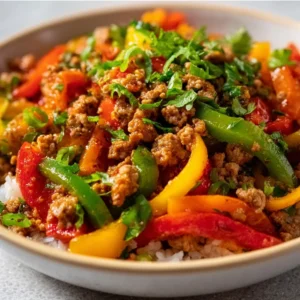 GROUND TURKEY AND PEPPERS SKILLET EASY 2 Ground Turkey and Peppers Skillet is displayed as a vibrant and colorful featured image.